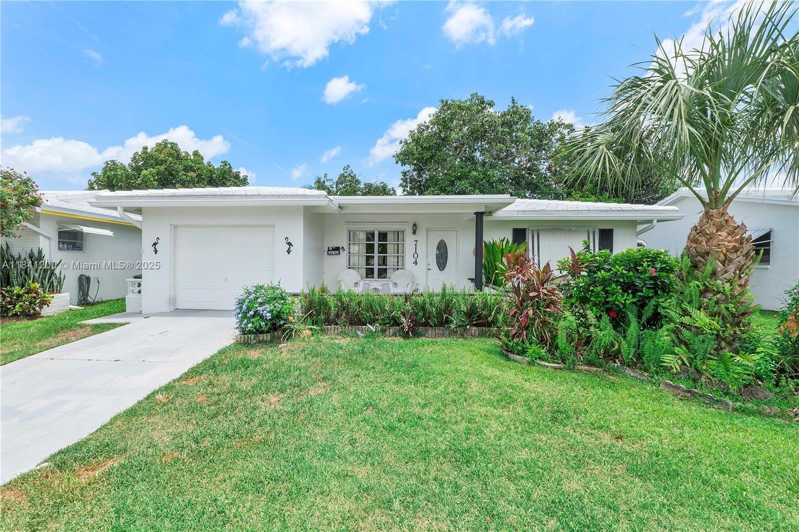Property Photo: 7104 NW 71st Ave FL 33321