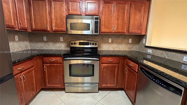 Property Photo:  12874 SW 31st Ct 114  FL 33027 