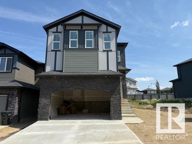 Property Photo:  1142 Gyrfalcon Crescent NW  AB T5S 0S5 