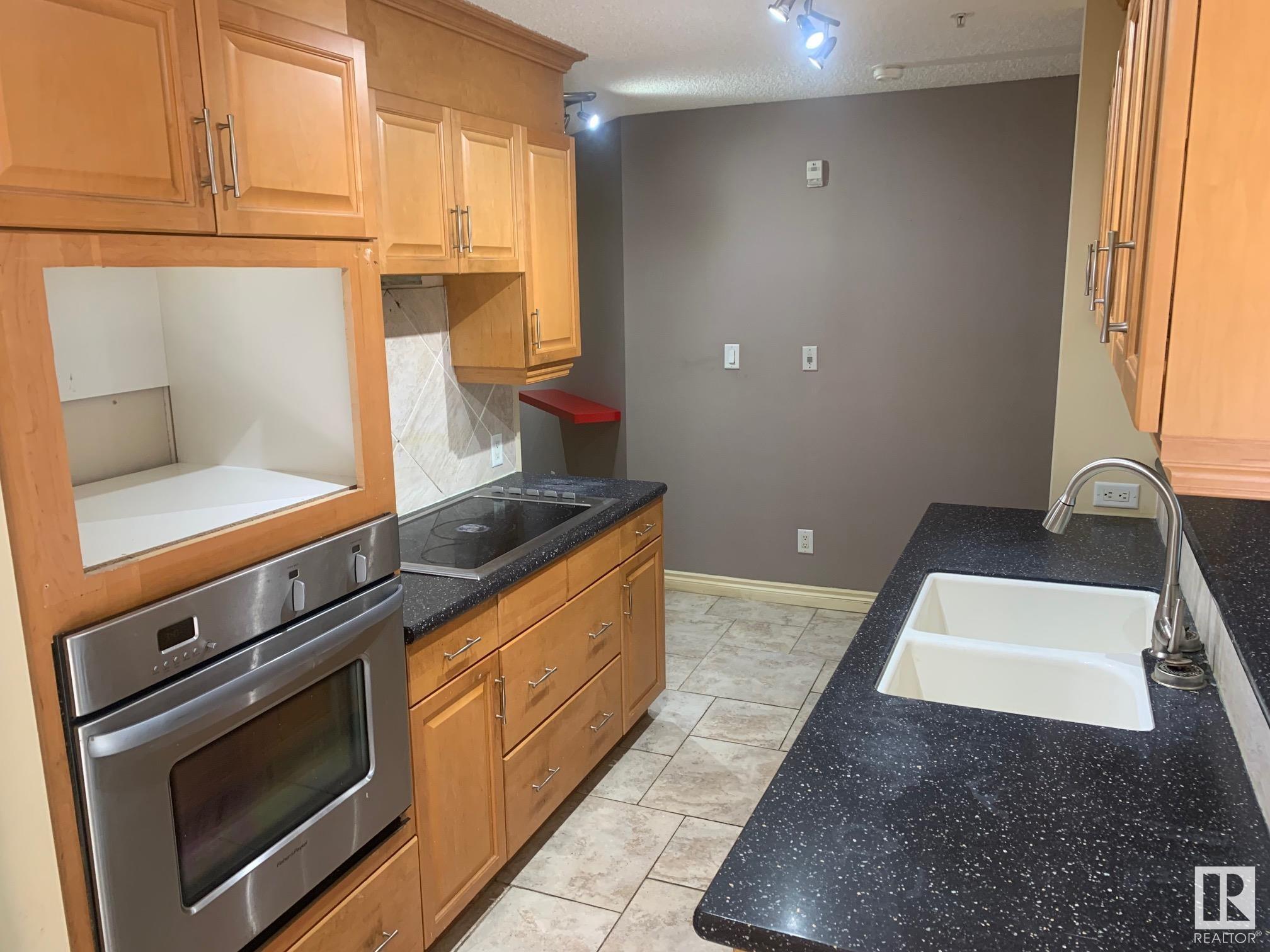 Property Photo:  10108 125 Street NW 105  AB T5N 4B6 
