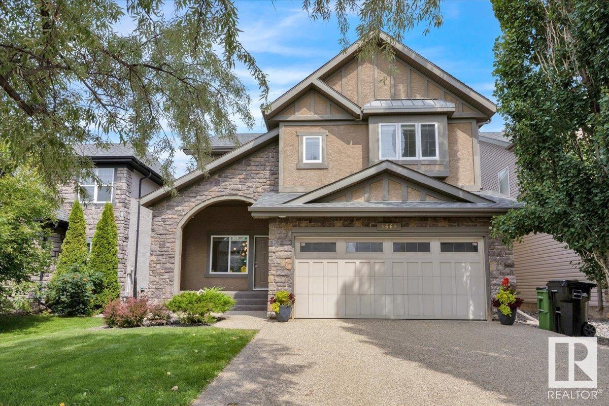 Property Photo:  1669 Hector Road NW  AB T6R 3B8 