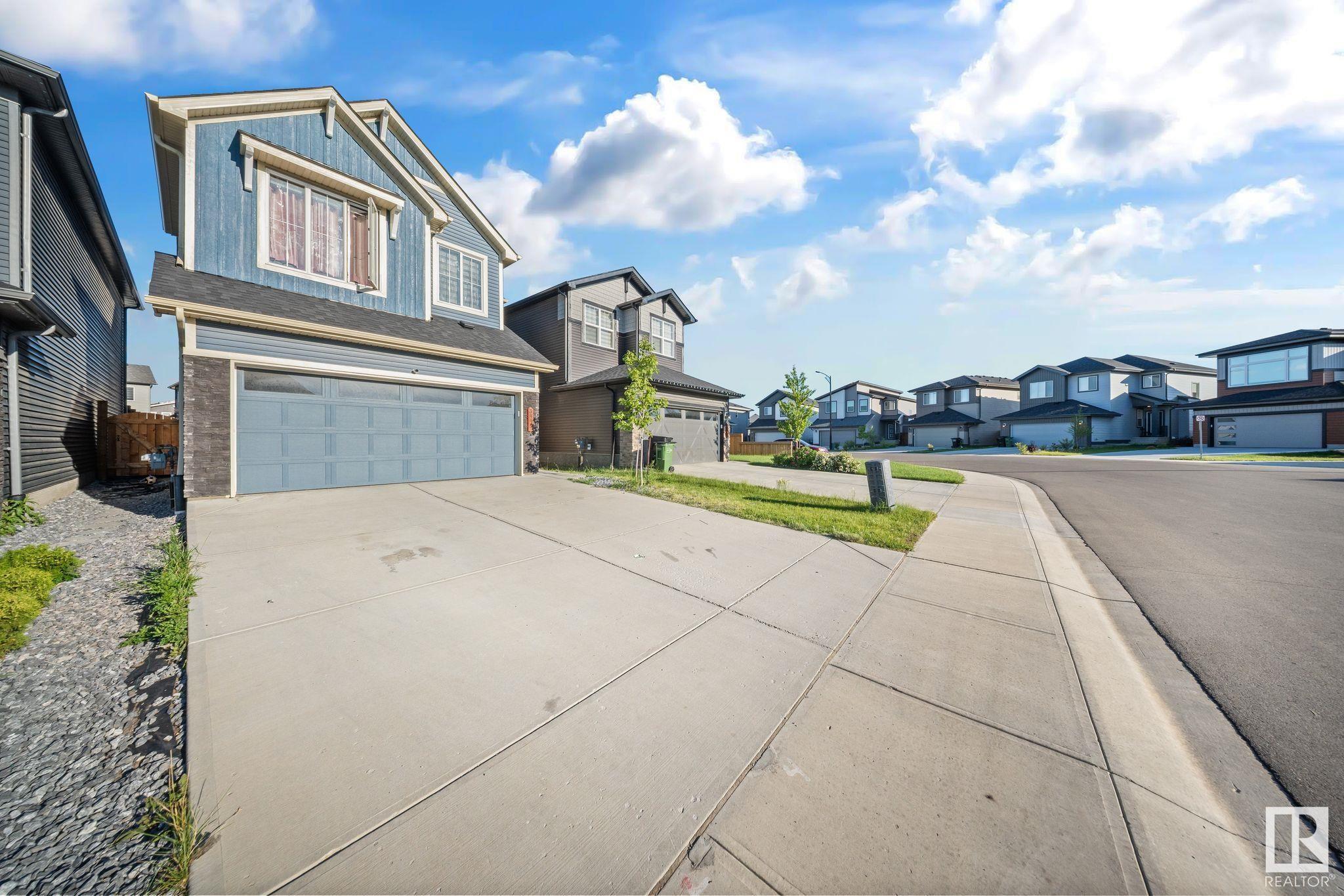 Property Photo: 3445 Checknita Terrace SW AB T6W 4W5