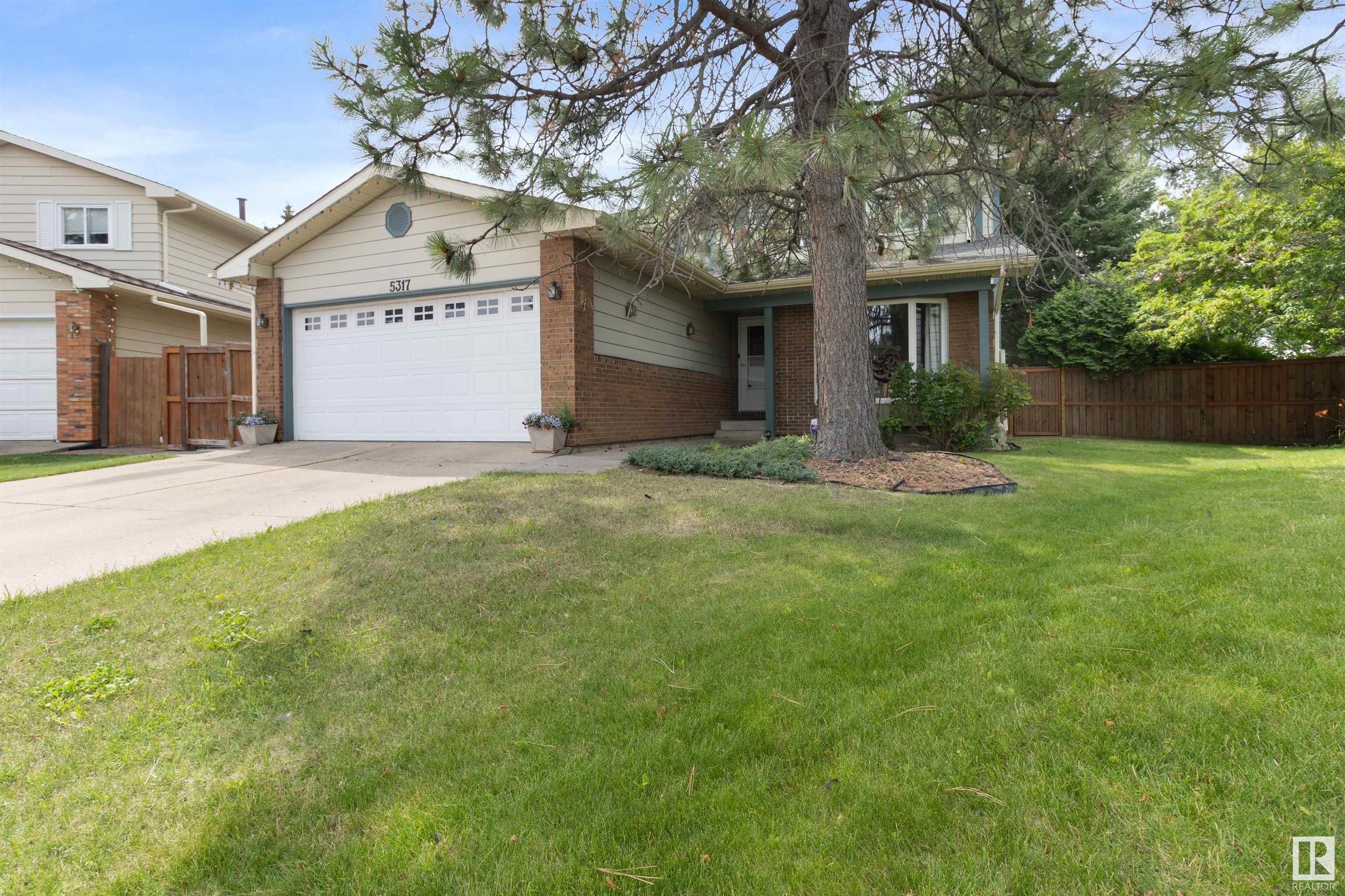 Property Photo:  5317 38A Avenue NW  AB T6L 2J4 
