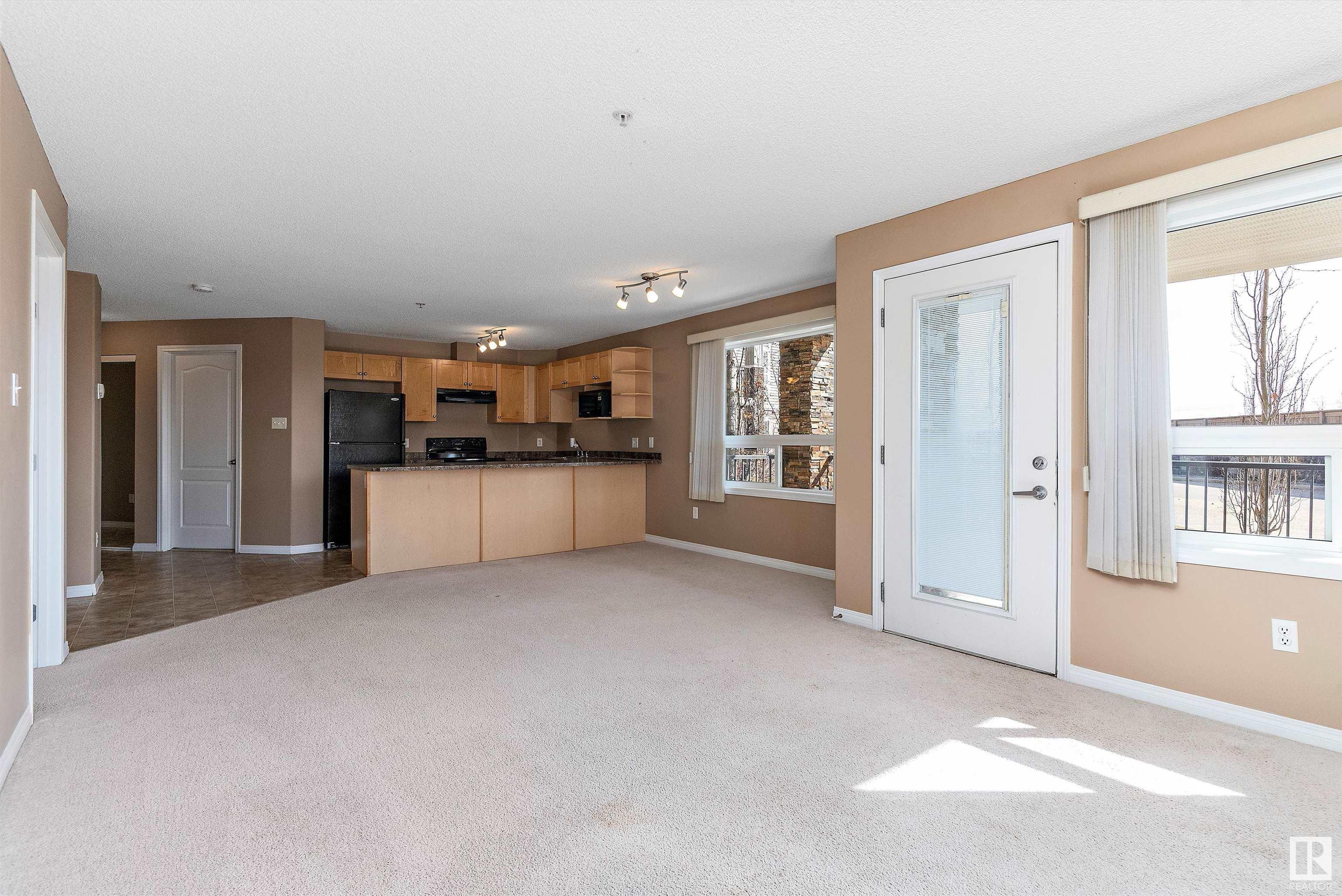 Property Photo:  9363 Simpson Drive NW 1124  AB T6R 0N2 