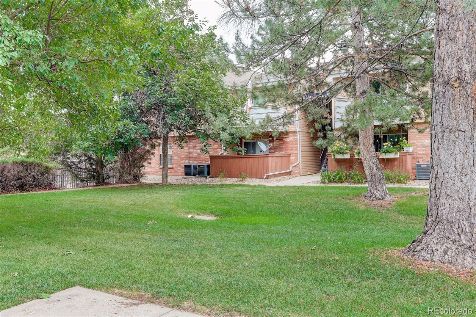 Property Photo: 3322 S Ammons Street 101 CO 80227