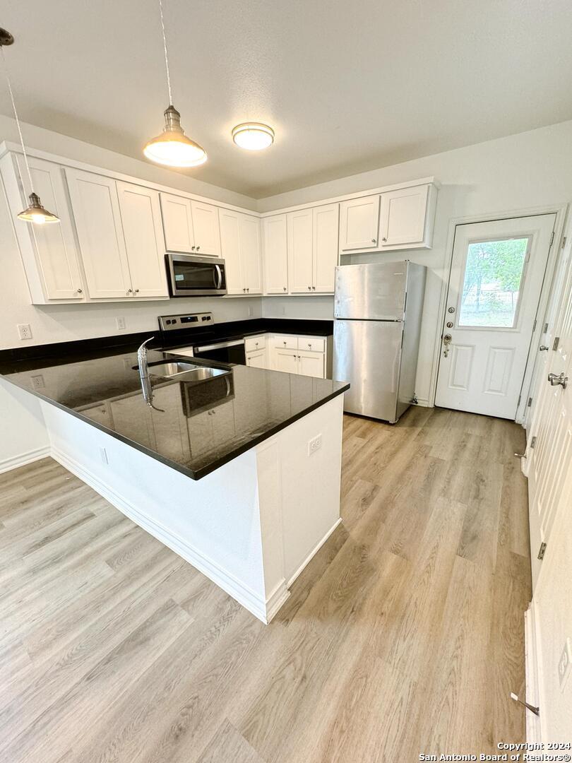 Property Photo: 707 Runnels Ave 101 TX 78208