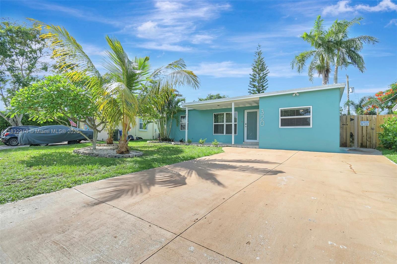 Property Photo:  320 NW 51st Ct  FL 33309 