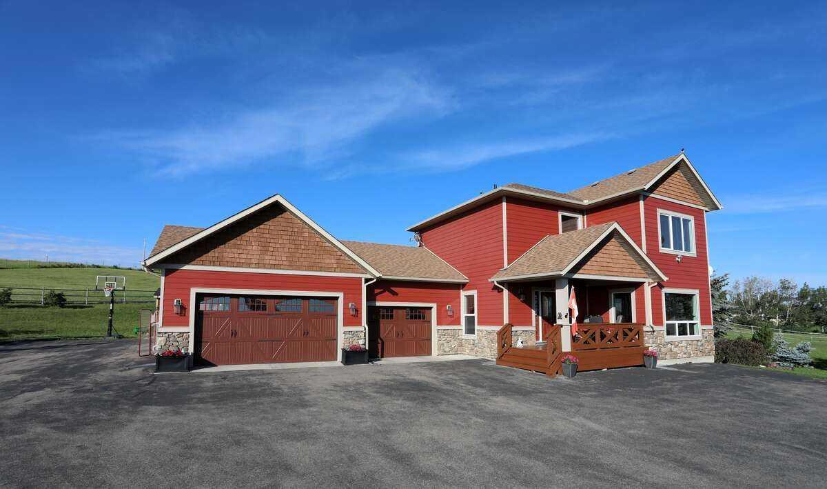 Property Photo: 32015 292 Avenue E AB T1S 4P7