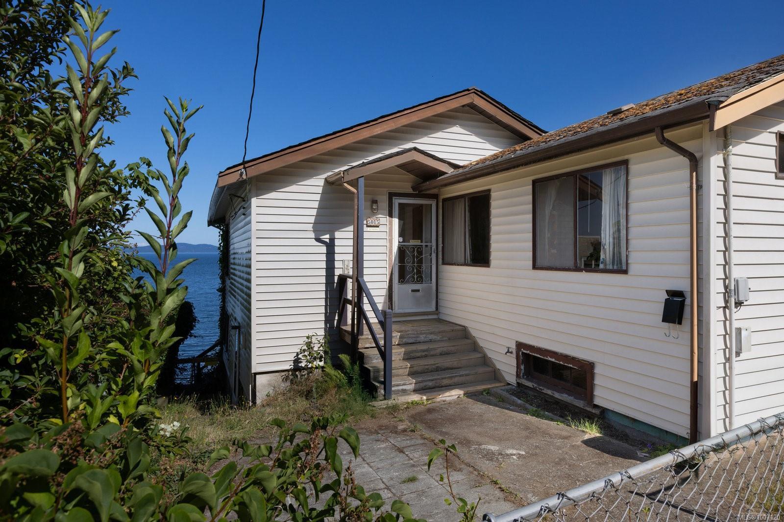 Property Photo: 5015 Cordova Bay Rd BC V8Y 2K1