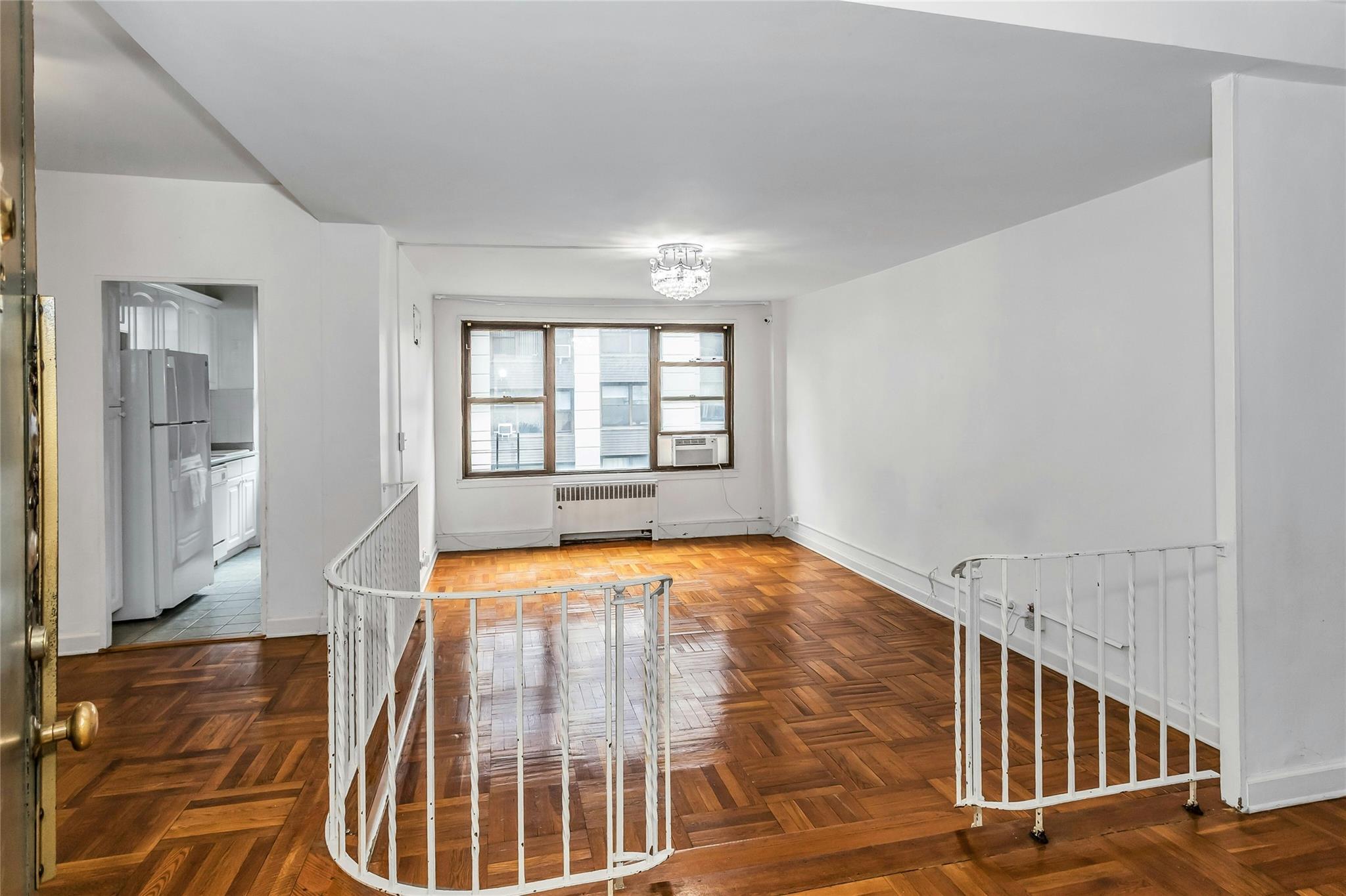 Property Photo:  98-50 63rd Drive 5F  NY 11374 