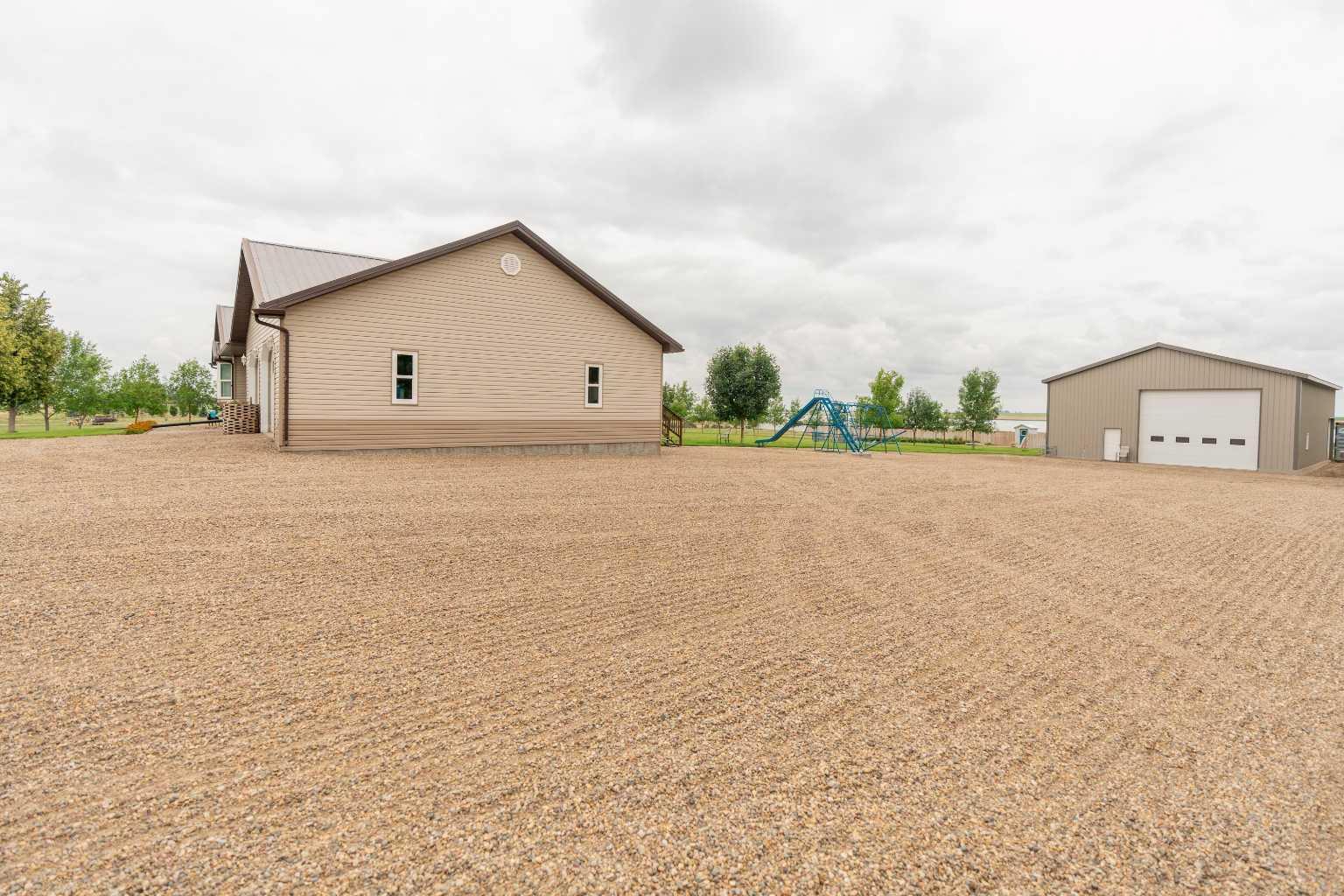 Property Photo:  123047 Township Road 102  AB T0K 0J0 
