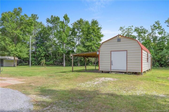 Property Photo:  1774 W. Liechty Road  LA 70611 