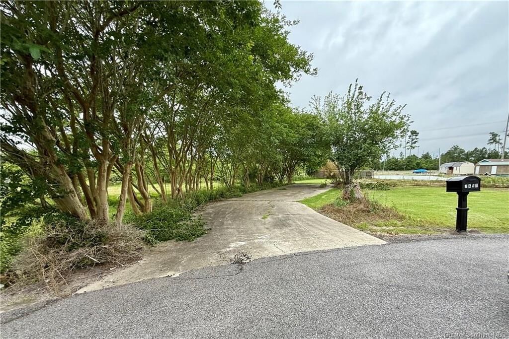 Property Photo:  7491 Pine Alley Lane  LA 70605 