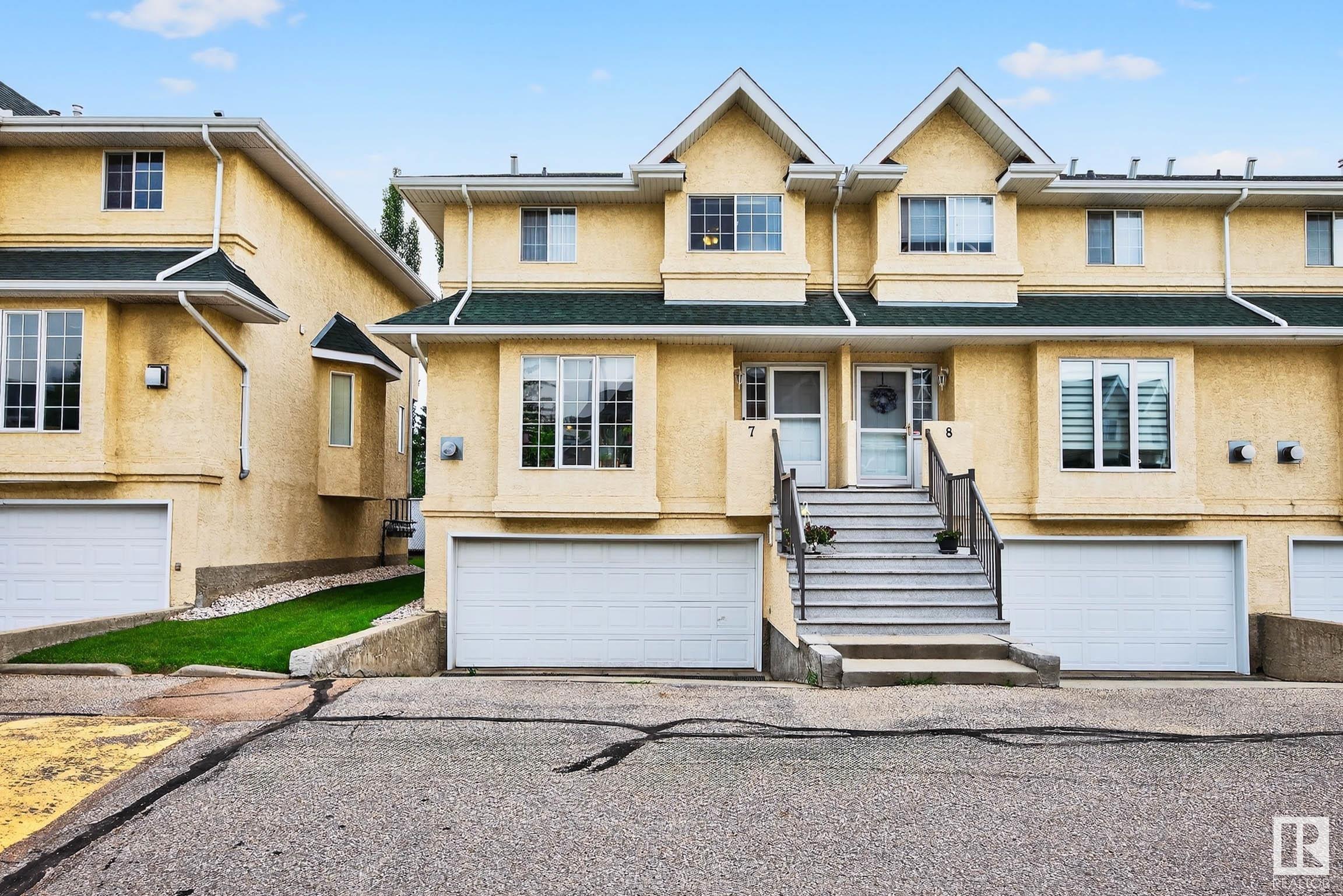 Property Photo: 2419 133 Avenue NW 7 AB T5A 5A5
