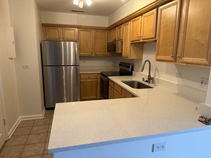 Property Photo: 1635 N Milwaukee Avenue 403 IL 60048