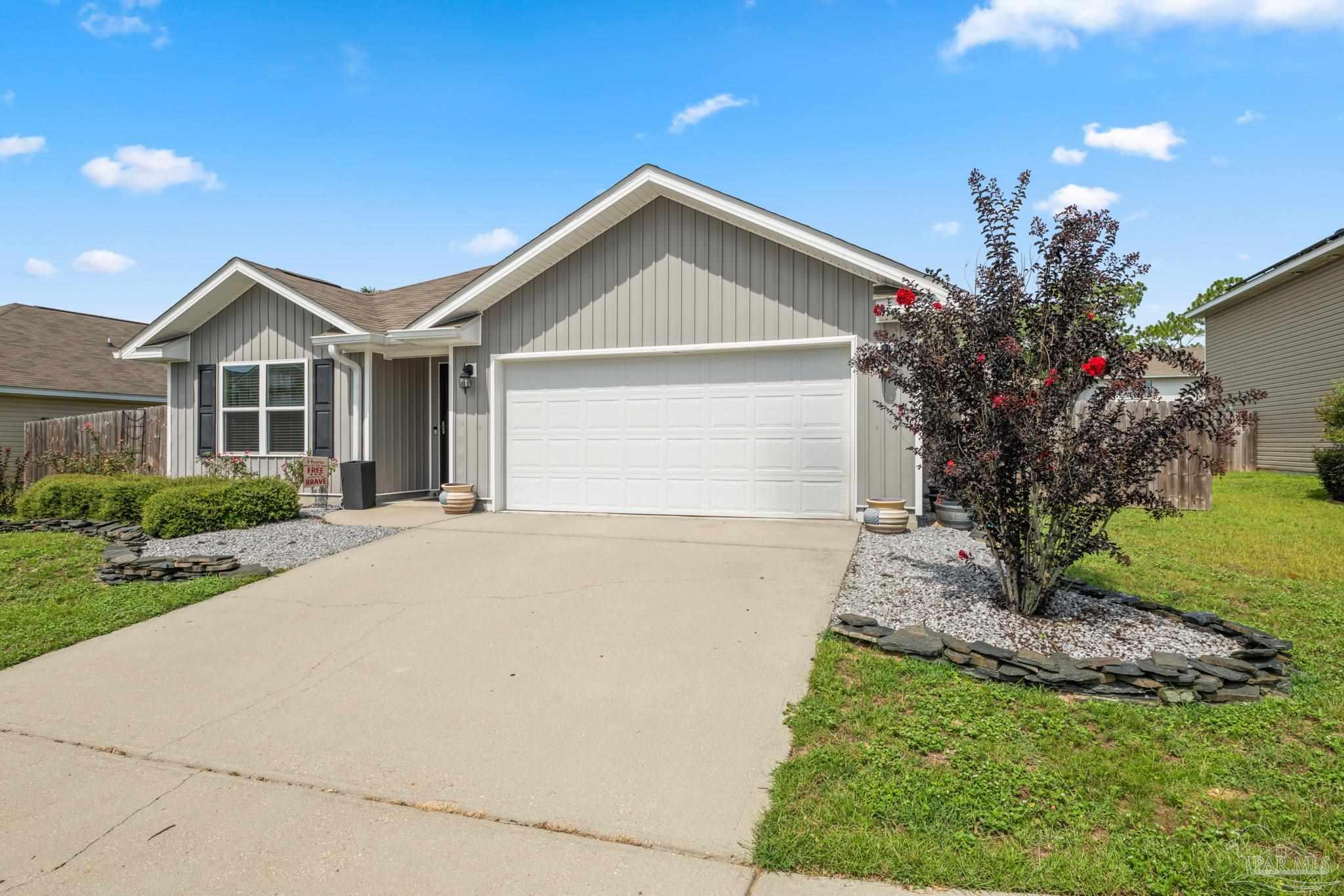 Property Photo: 5887 Southern Bell Ct FL 32570