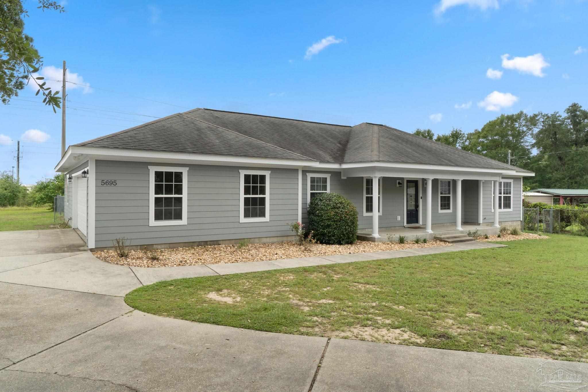Property Photo: 5695 Meadowlark Cir FL 32570