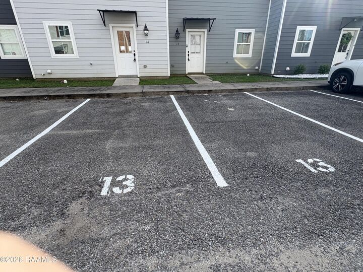 Property Photo:  13 Townhouse Cove  LA 70506 