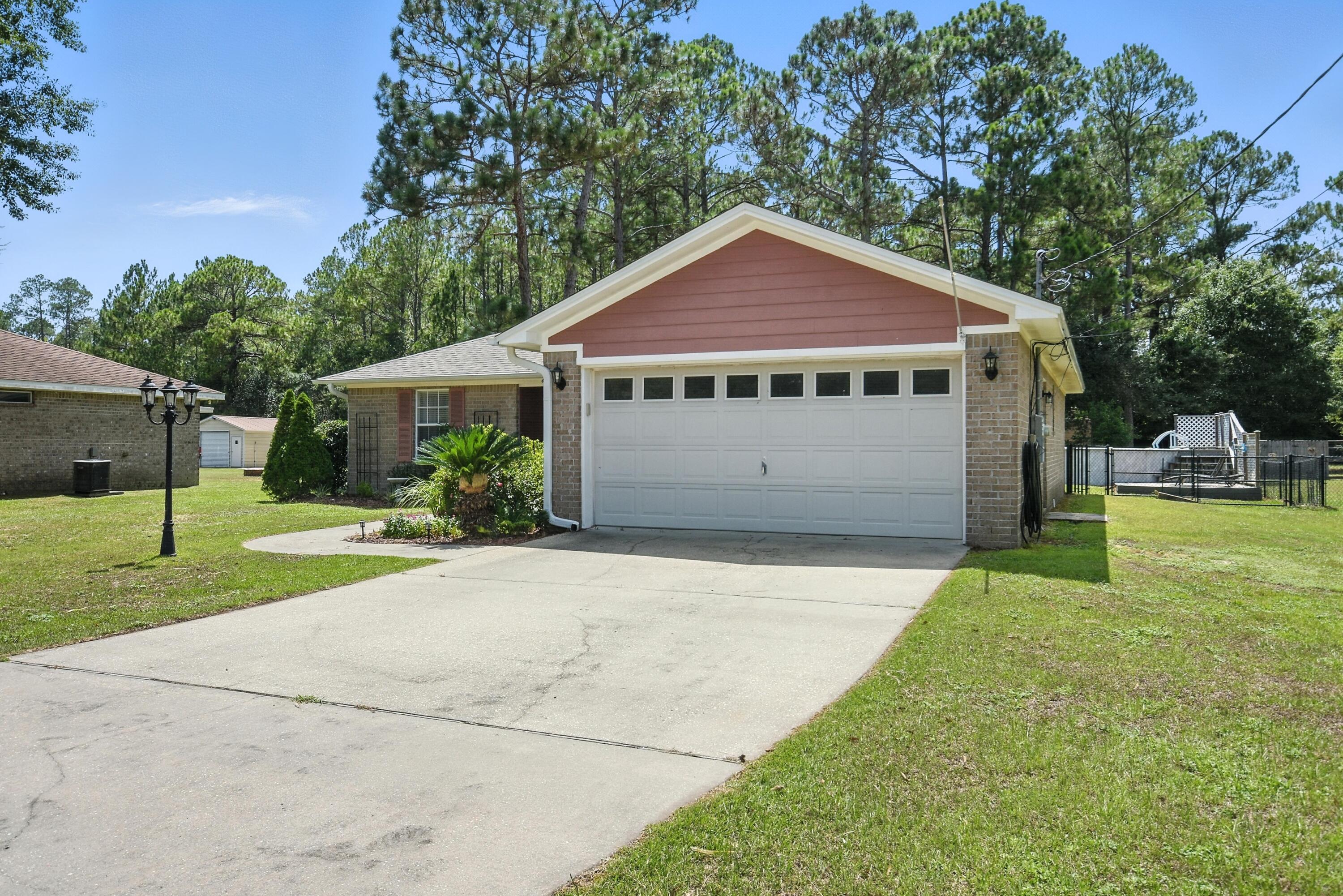Property Photo: 4237 Melton Road FL 32583