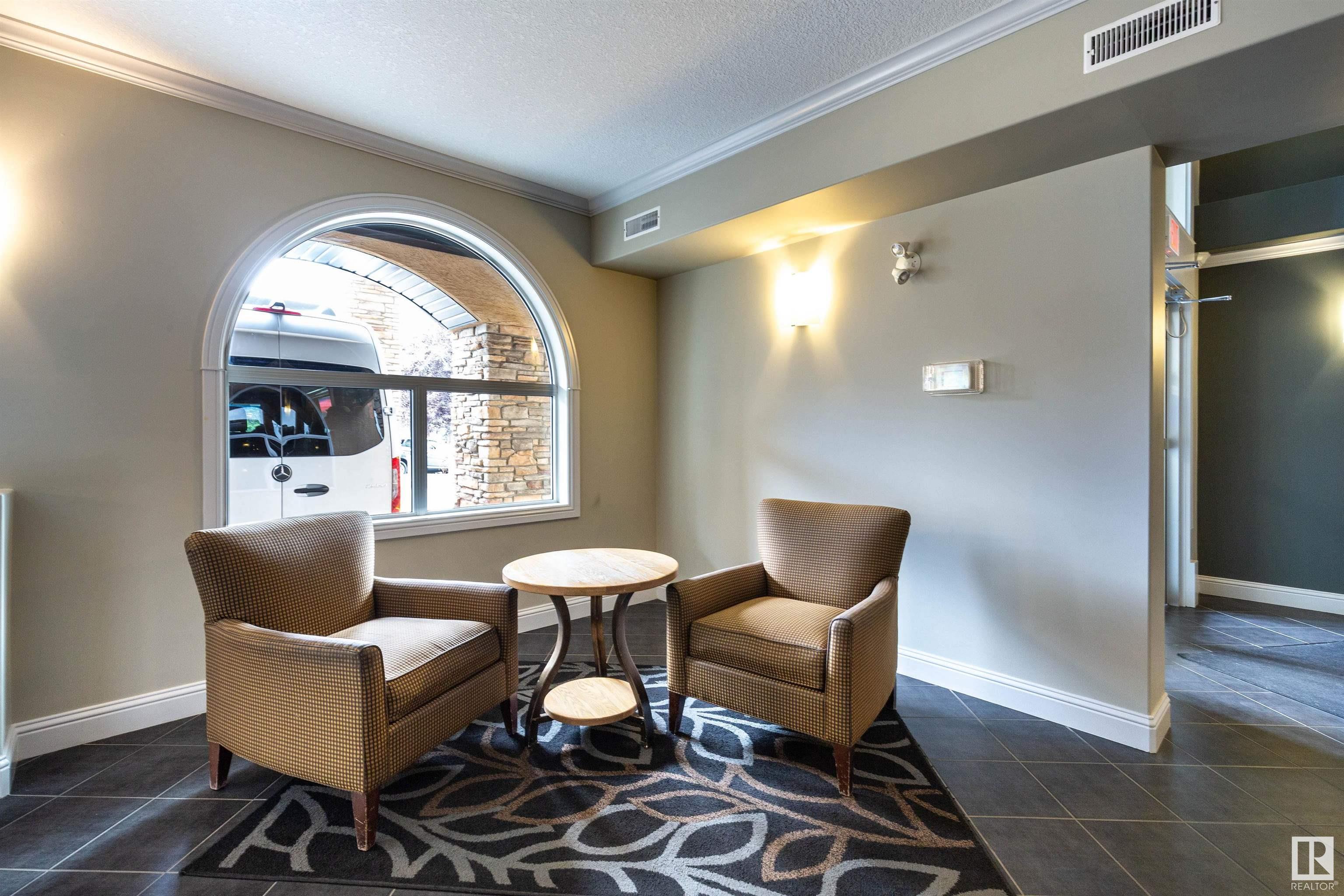 Property Photo: 14604 125 Street NW 112 AB T5X 0B4
