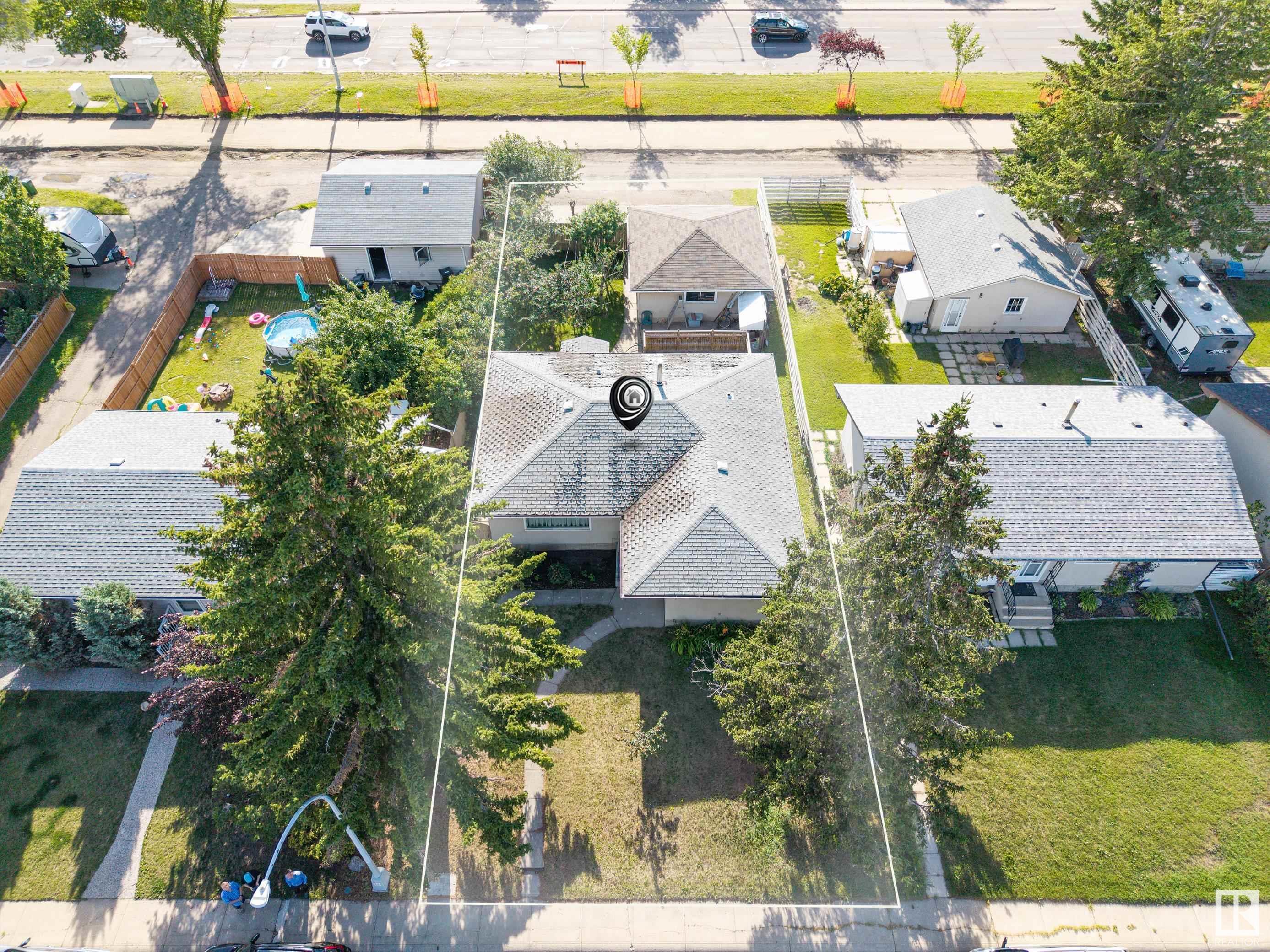 Property Photo: 14424 65 Street NW AB T5A 2E7