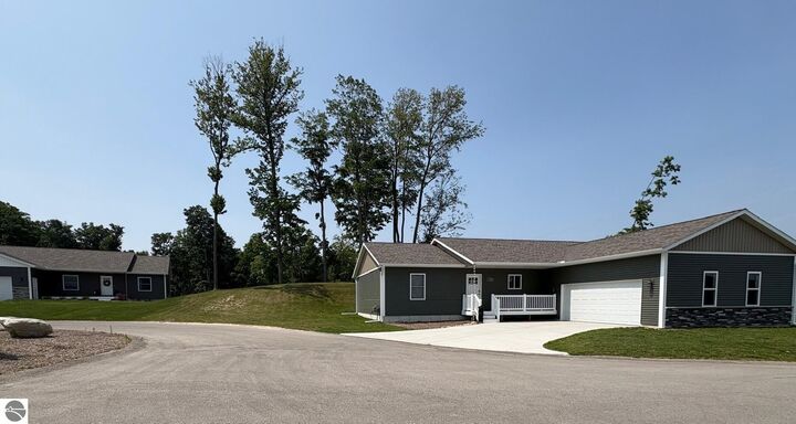 Property Photo:  1420 Umber Drive  MI 49696 