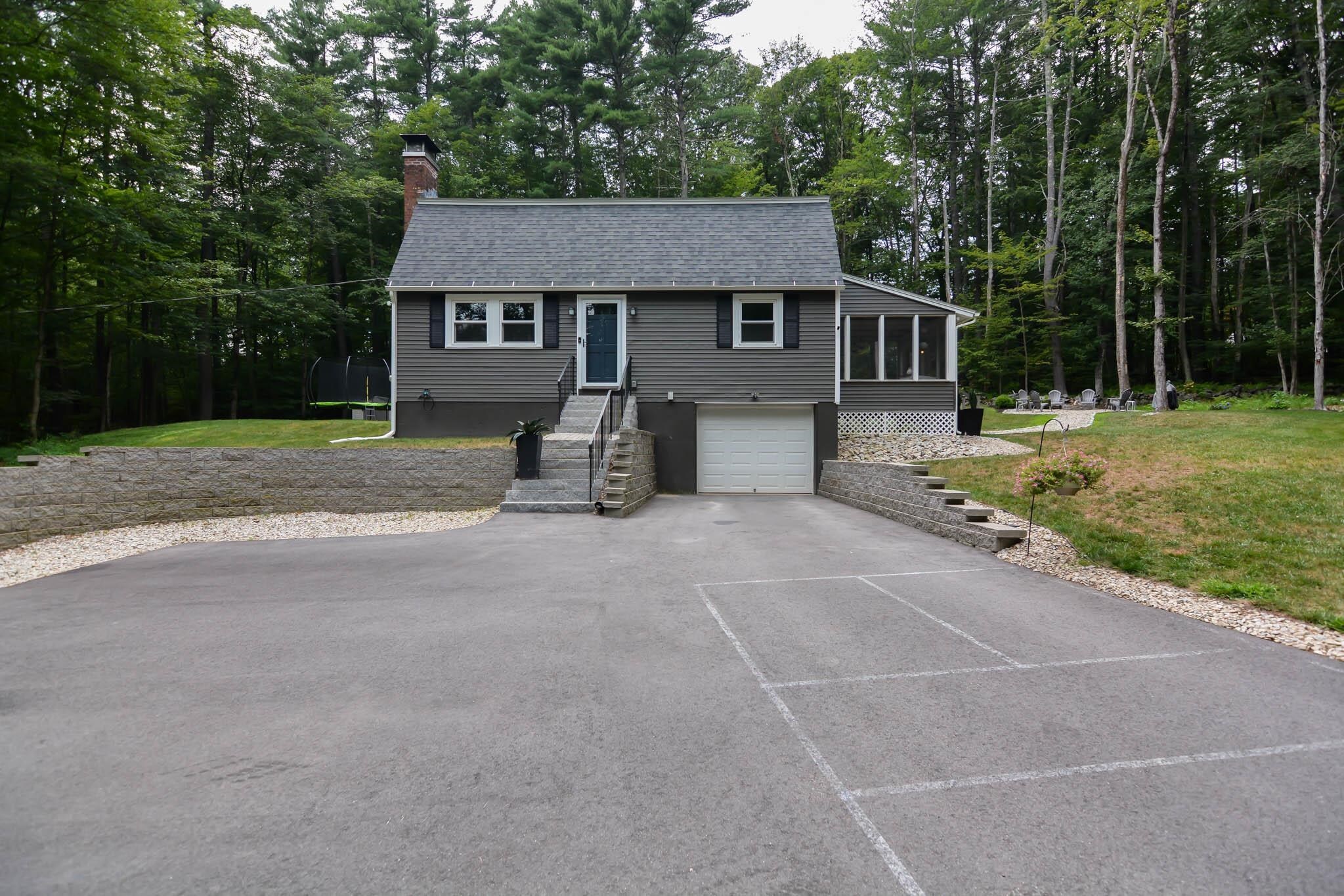 Property Photo: 12 Deerwood Drive NH 03031