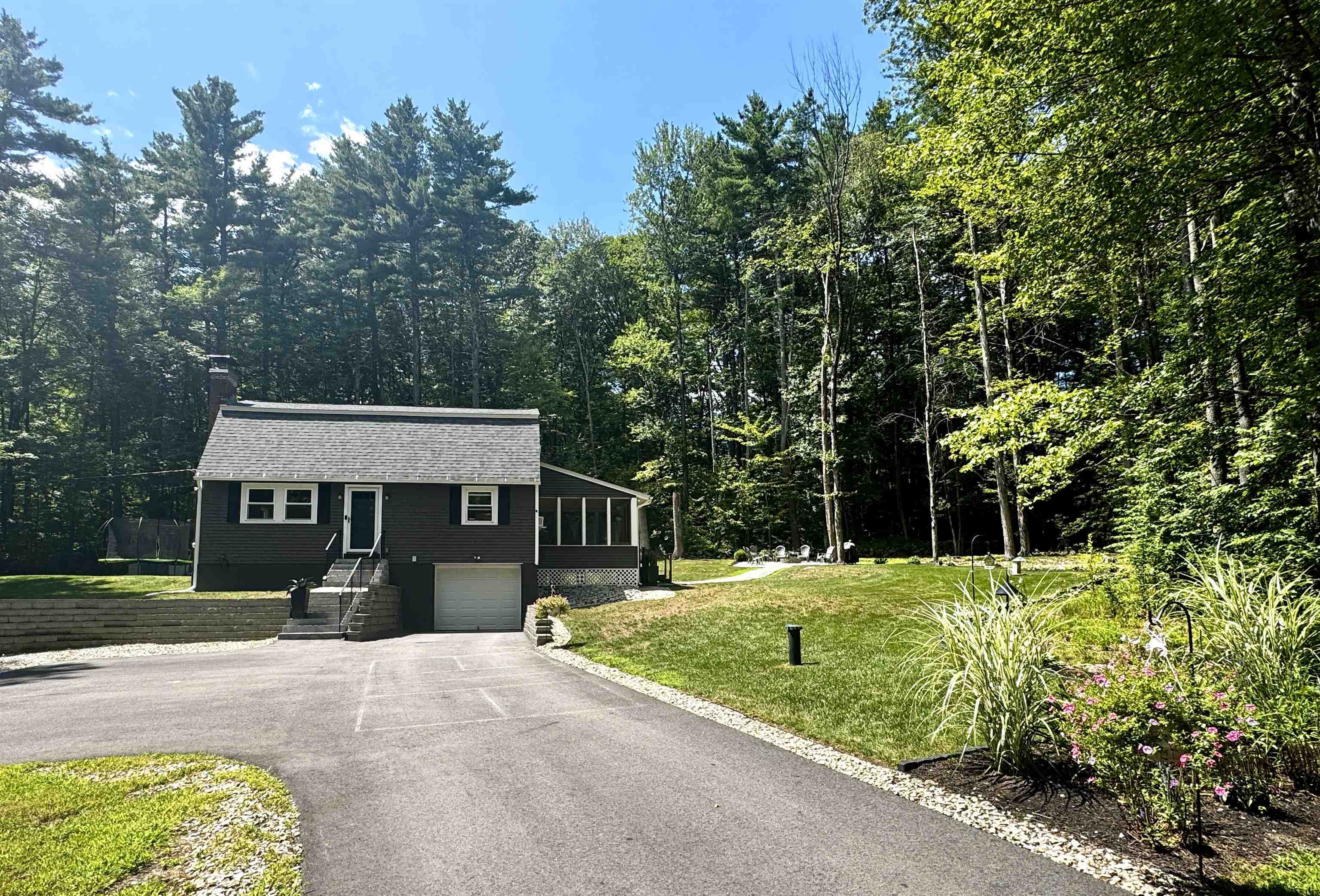 Property Photo: 12 Deerwood Drive NH 03031