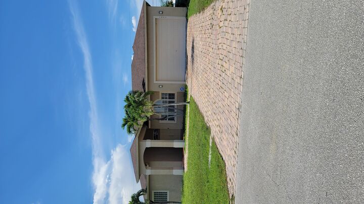 Property Photo: 1025 SW Dartmouth Avenue FL 34953