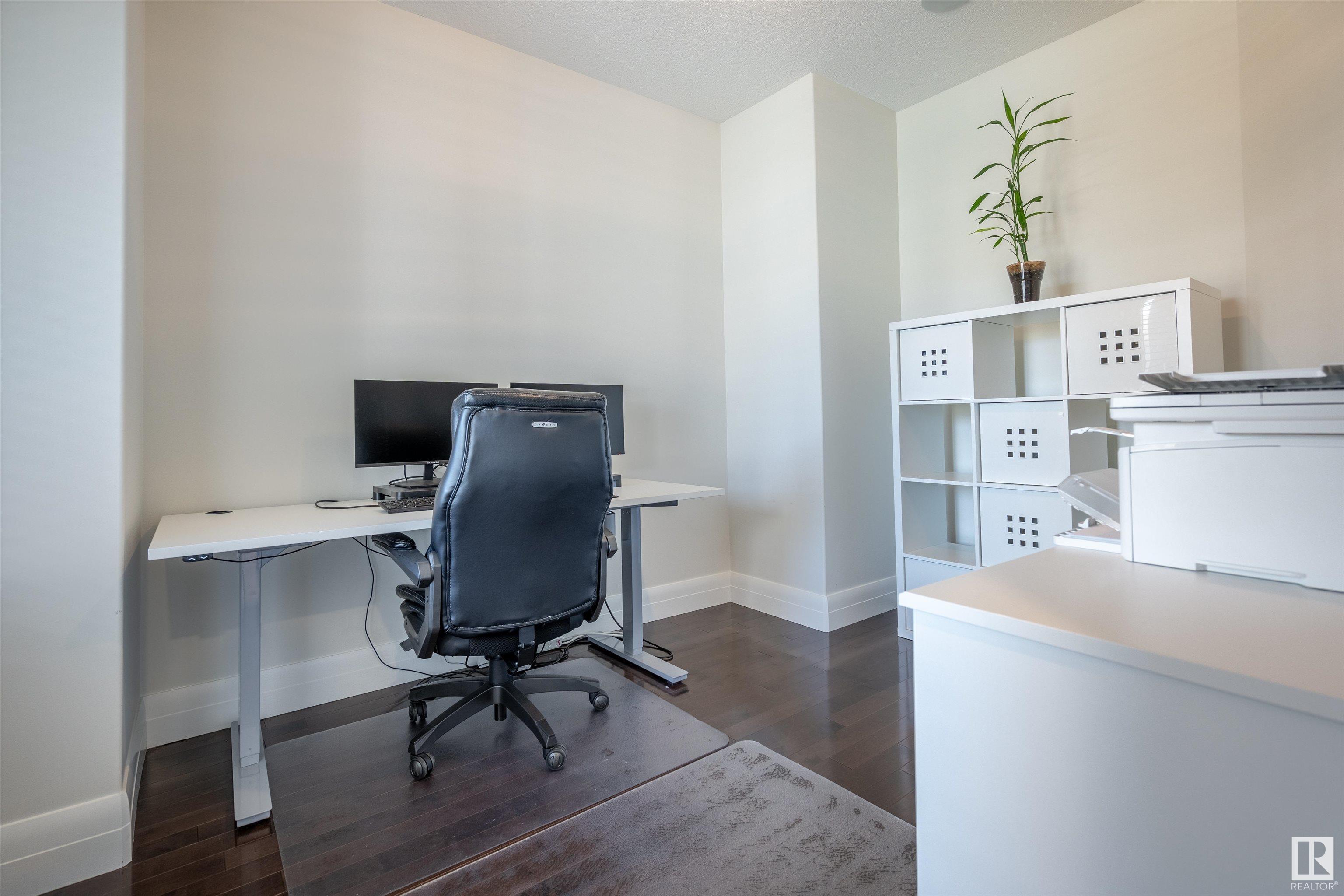 Property Photo: 10550 Ellerslie Road SW 20 AB T6W 0Y2