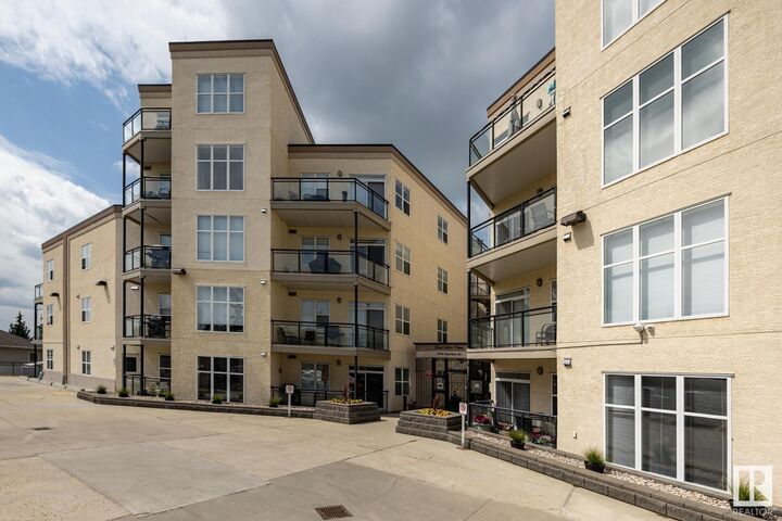 Property Photo: 9940 Sherridon Drive 300 AB T8L 4C9