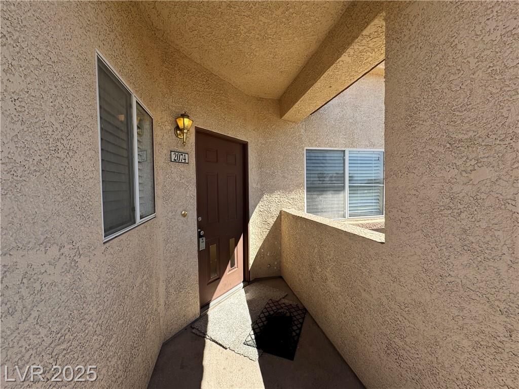 Property Photo: 8501 West University Avenue 2074 NV 89147