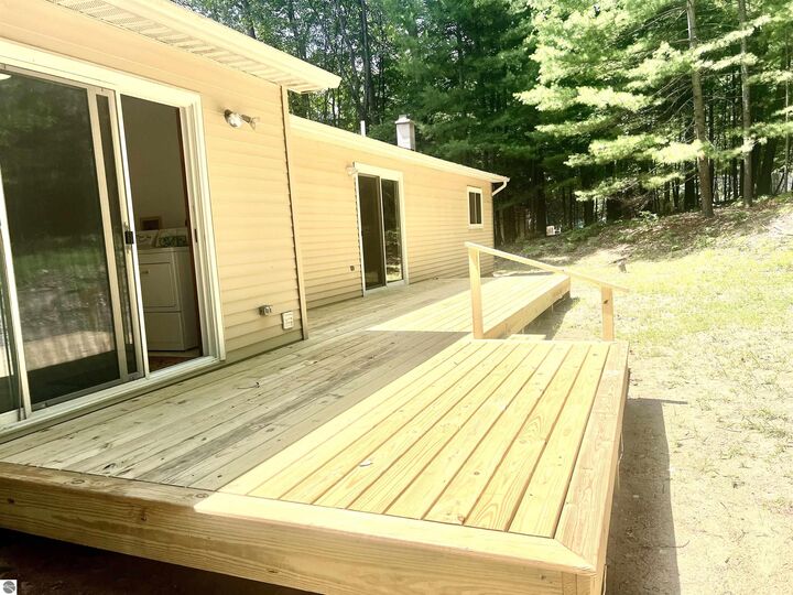 Property Photo:  315 Timber Hill  MI 49696 