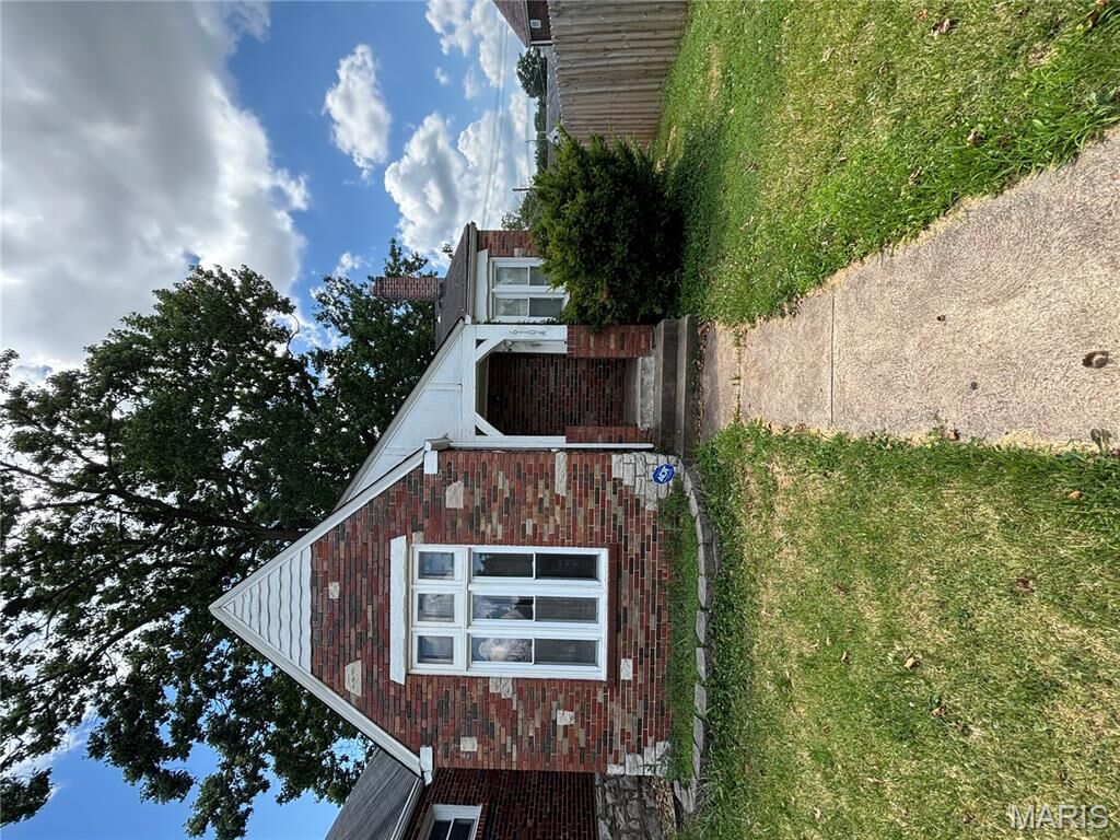 Property Photo:  6104 N Pointe Boulevard  MO 63147 