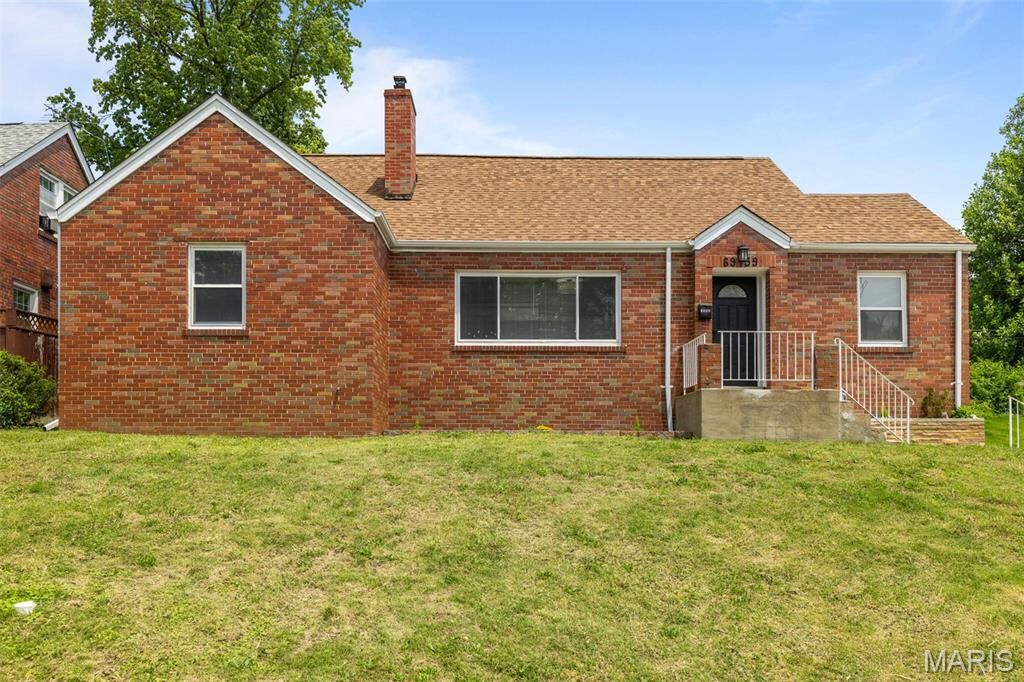 Property Photo:  6939 Roland Boulevard  MO 63121 