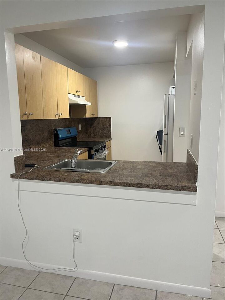 Property Photo: 14863 SW 104th St 27-13 FL 33196
