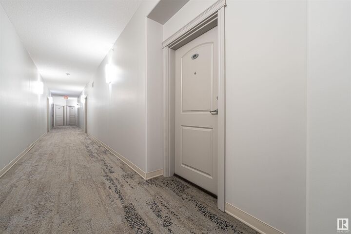 Property Photo: 12408 15 Avenue SW 419 AB T6W 1X2