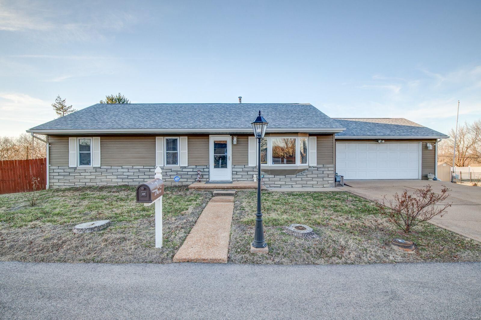 Property Photo:  809 Alta Ave  MO 63070 