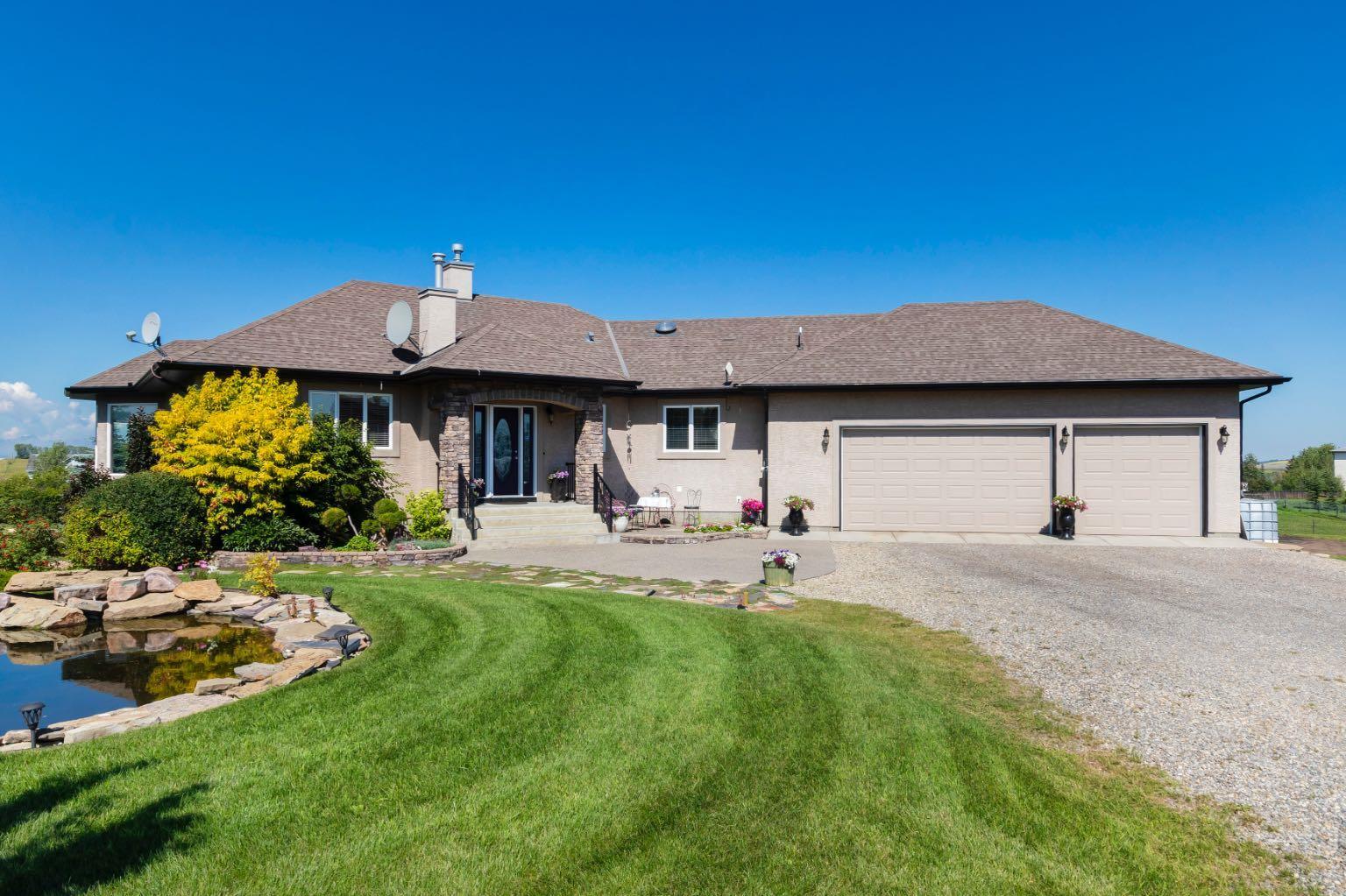 Property Photo:  42210 Cochrane Lake W  AB T4C 2B1 