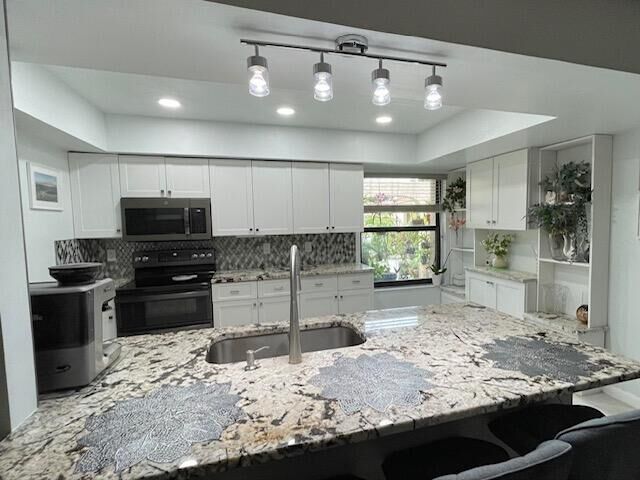 Property Photo:  5975 Forest Grove 3 Drive 3  FL 33437 