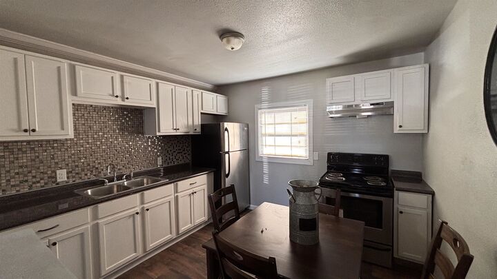 Property Photo: 4433 &Amp 4435 Neches Ave. TX 77642