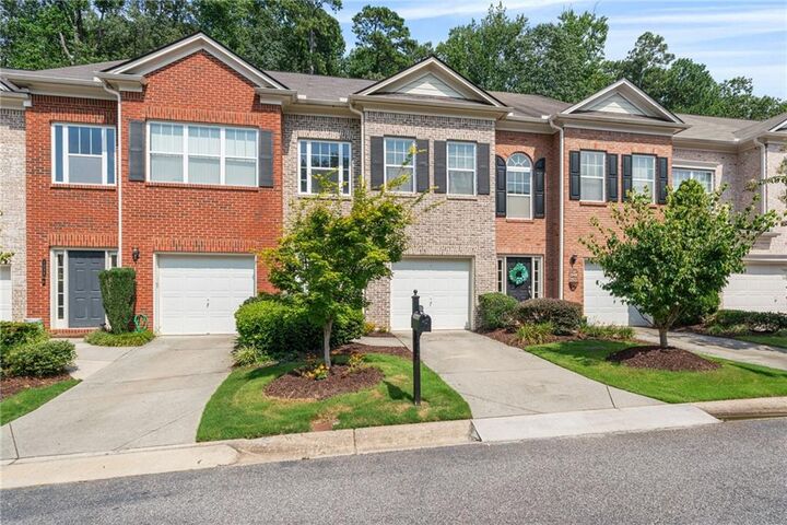 Property Photo:  1030 Firethorne Pass  GA 30040 