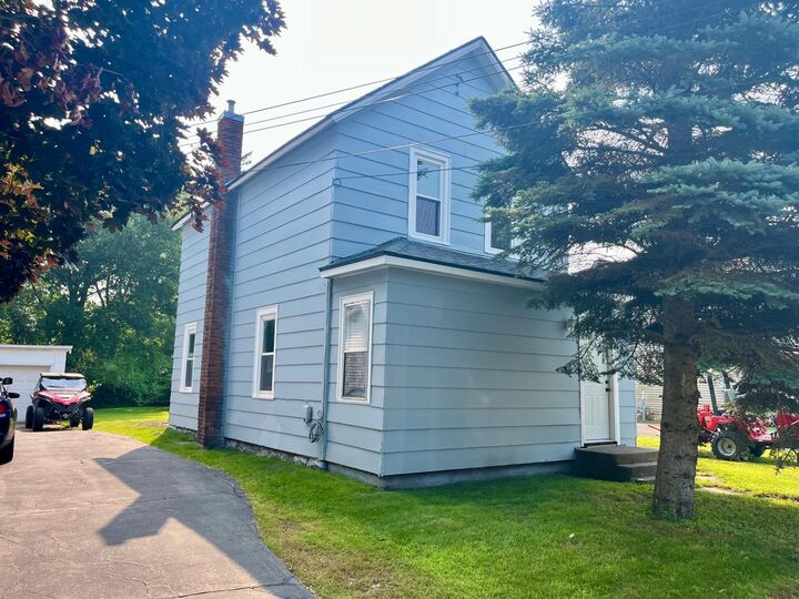 Property Photo:  230 Cottage Grove Avenue  MN 56329 