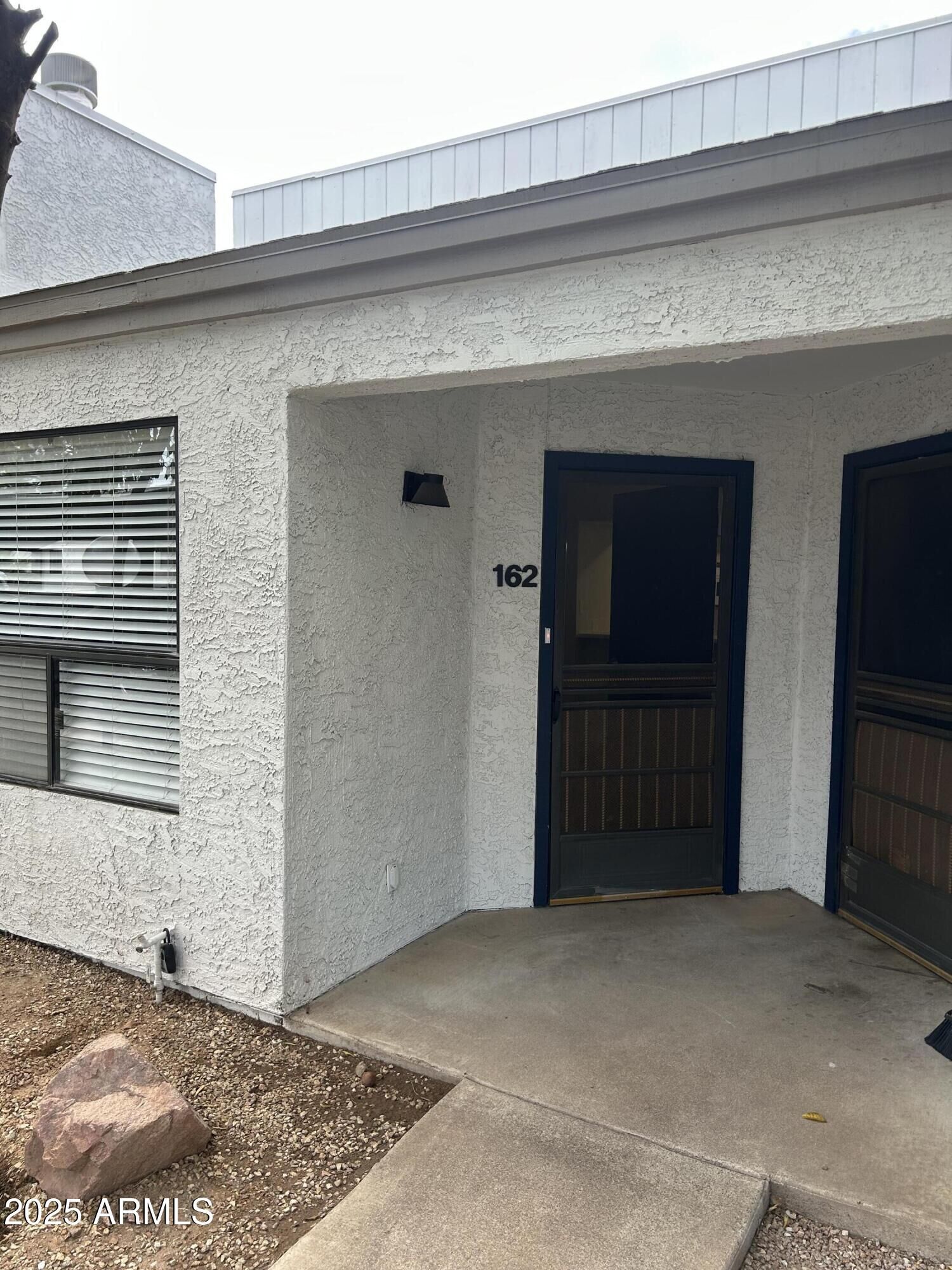 Property Photo: 1444 N Recker Road 162 AZ 85205