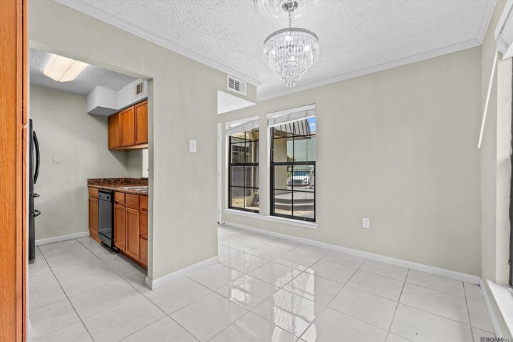 Property Photo:  10288 W Winston Ave #3  LA 70809 