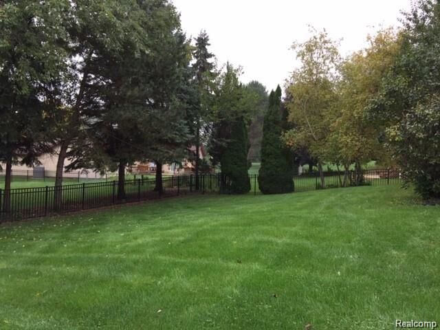 Property Photo:  24635 Simmons Drive  MI 48374 