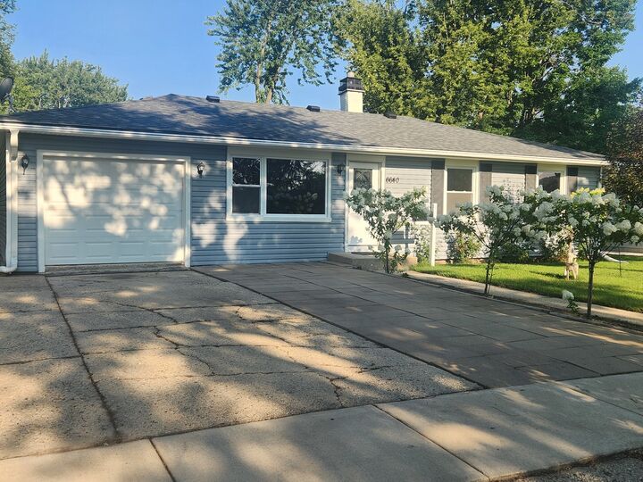 Property Photo:  6640 Peach Tree Street  IL 60133 