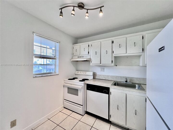 Property Photo:  220 SW 9th Ave 209  FL 33009 