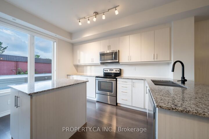 Property Photo: 80 Eastwood Park Gardens 9 ON M8W 0B2