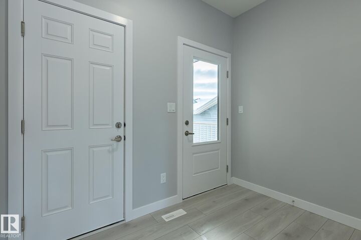 Property Photo:  10716 99 Street  AB T8R 2R8 